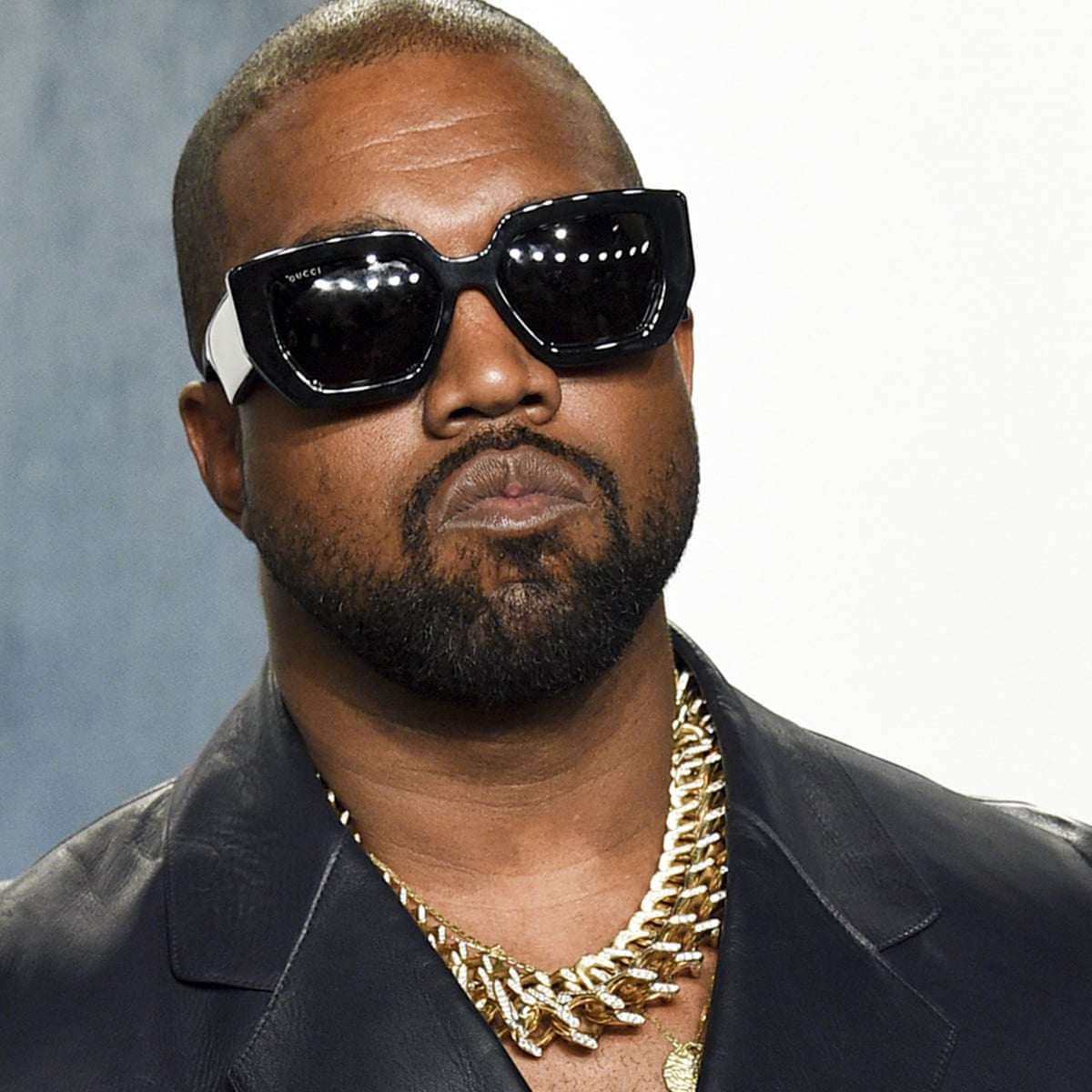 Kanye West clashes with paparazzi over questions about ‘controlling’ his wife